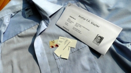 A blouse, my resume and some calling cards.